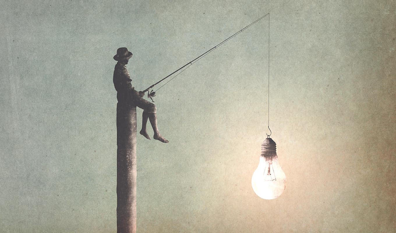 Surreal Illustration Of Man Sitting With Fishing Pole, A Glowing Light Bulb Attached To His Fishing Line