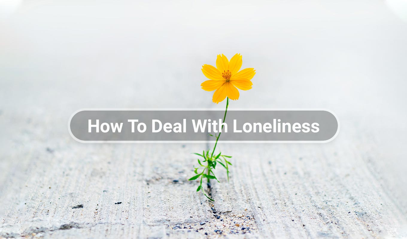 Photograph Of Yellow Flower Growing Through Crack With Text Overlay "How To Deal With Loneliness"