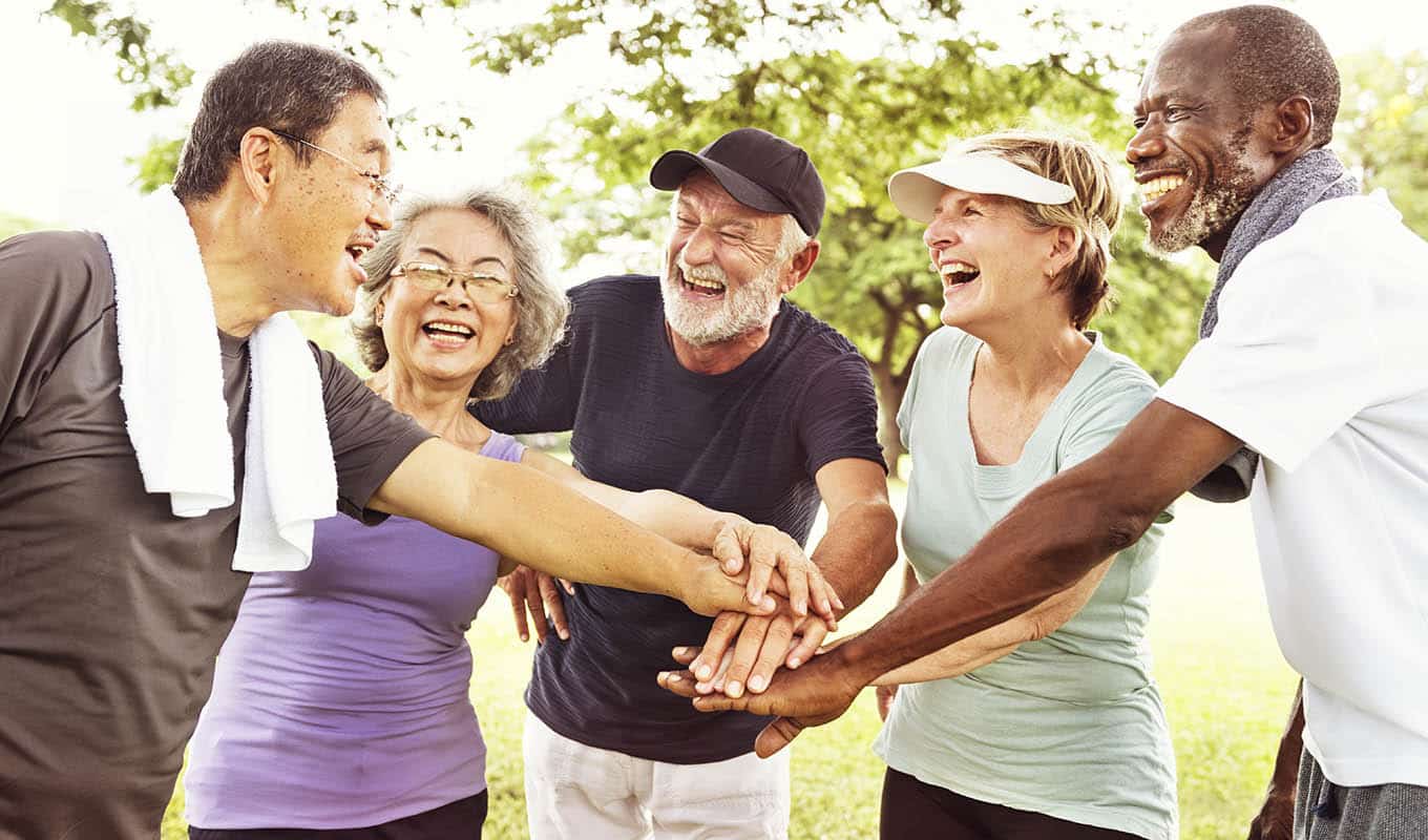 photograph of five senior citizens coming together to treasure their golden years without being lonely