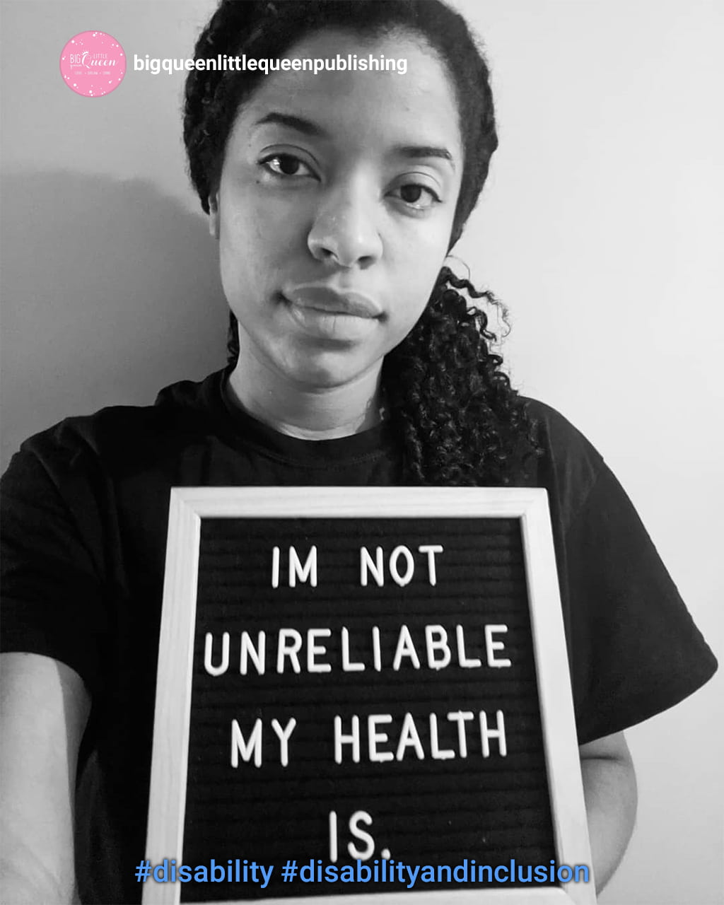 black and white photo of a young american holding a sign stating "im not unreliable, my health is"