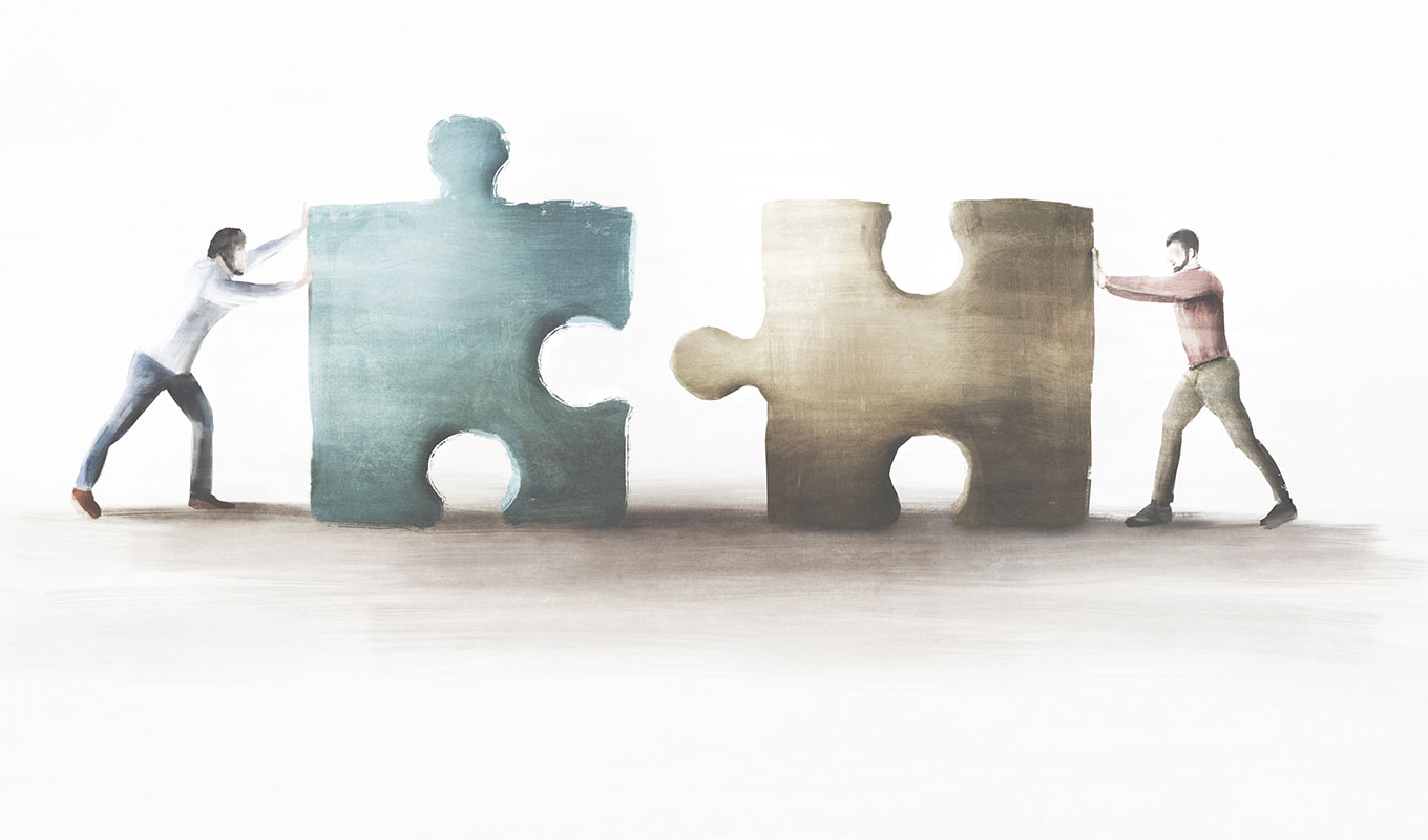 Illustration Of Two Men Working Together To Push Two Large Puzzle Pieces Together